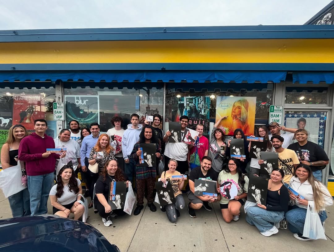 Group of fans outside the store